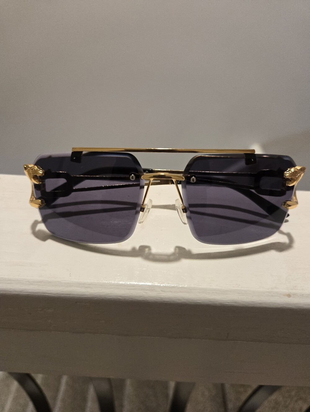 Men’s Gold Rimless Sunglasses with Dark Gray Lenses